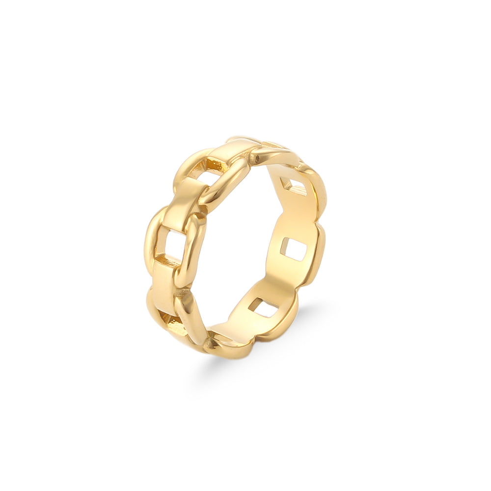 a gold ring with a chain on it